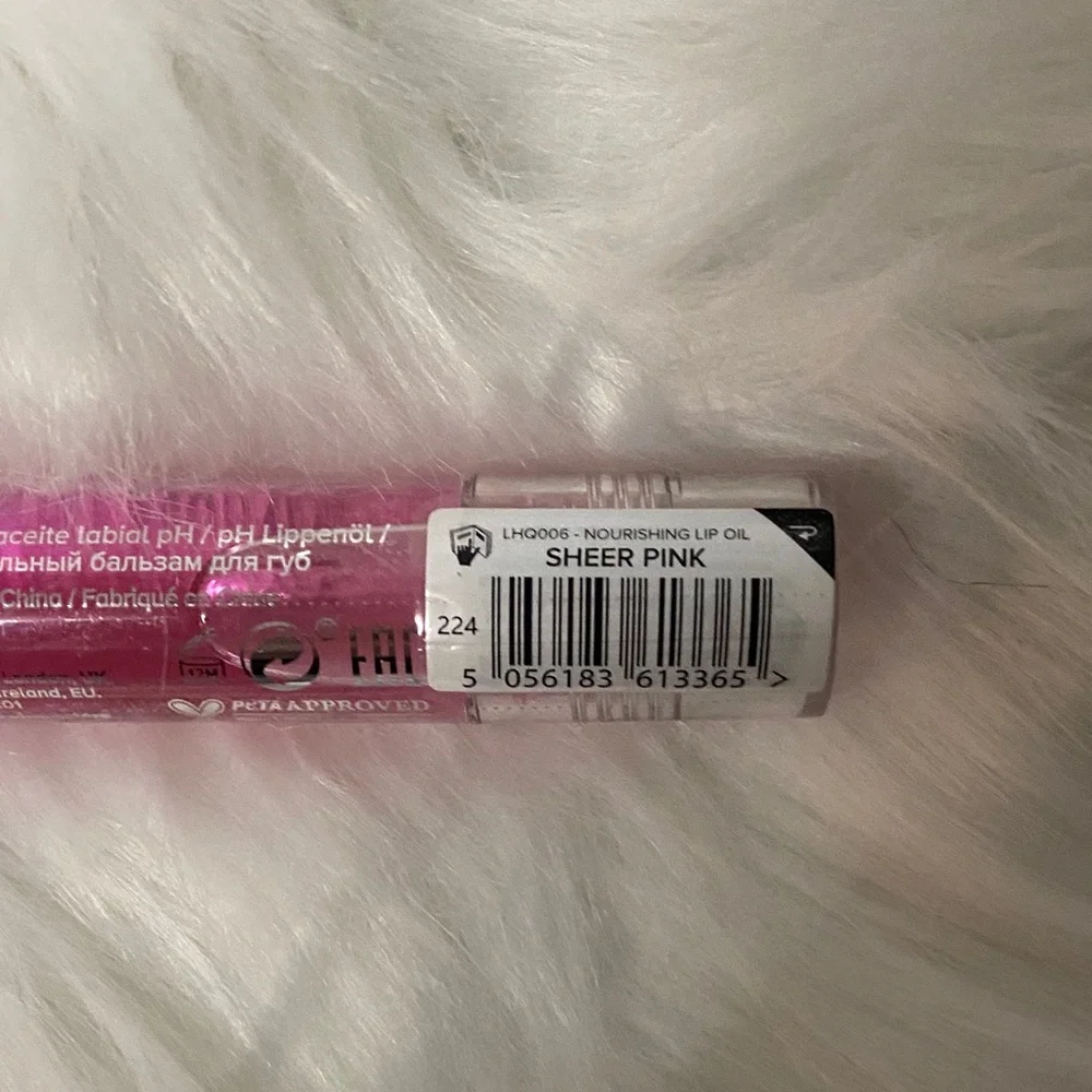 Lottie London Harley Quinn color changing Lip Oil sheer pink